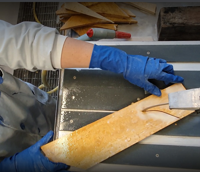 Preparation of the templates and cutting of the marbles for the making of the three-dimensional mosaic.     