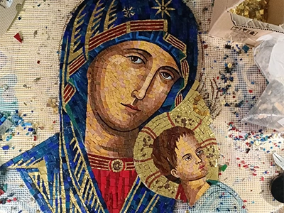 Deatils of the making of a mosaic